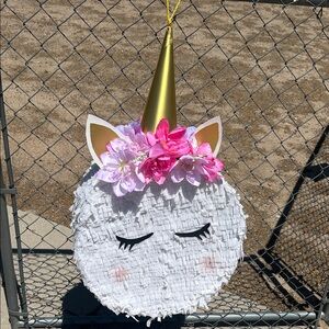 Unicorn Piñata with Gold Horn and Pink Flowers
